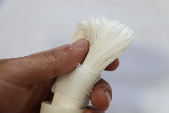 A bundle of spun hollow fibers before potting into a module.
