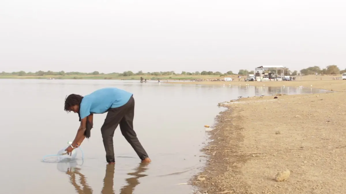 Collecting source water during a partner deployment in Senegal, 2020.